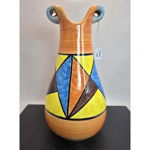 277 - An attractive vintage vase having a vibrant geometric hand painted design, the vase displays nicely ... 