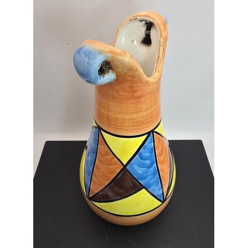 277 - An attractive vintage vase having a vibrant geometric hand painted design, the vase displays nicely ... 