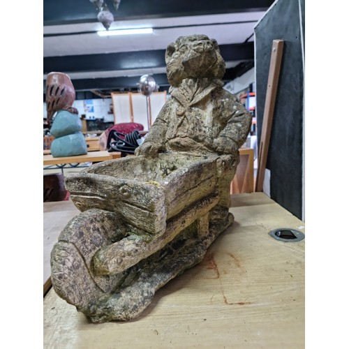 429 - Large Mr Badger (Wind in the Willows) holding a wheelbarrow formed stoneware planter in good looked ... 