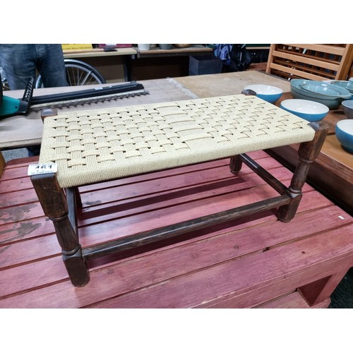 461 - Clean and tidy small wicker topped stool with an oak frame has a height of 29cm length 58cm depth 30... 
