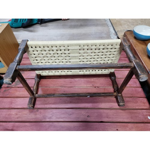 461 - Clean and tidy small wicker topped stool with an oak frame has a height of 29cm length 58cm depth 30... 