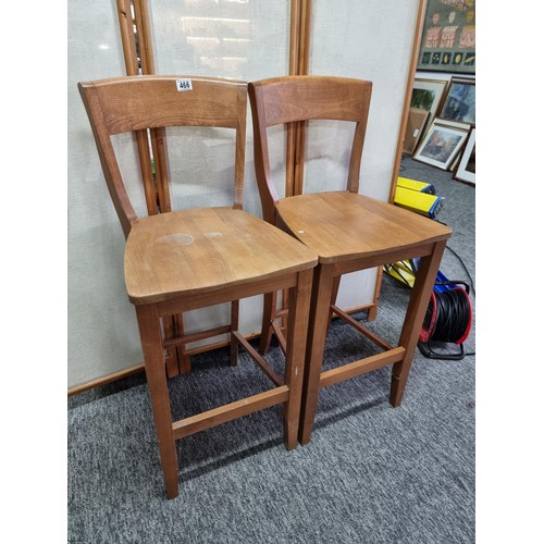 466 - Pair of good quality solid teak bar stools with backs both presenting good grain and are in clean co... 