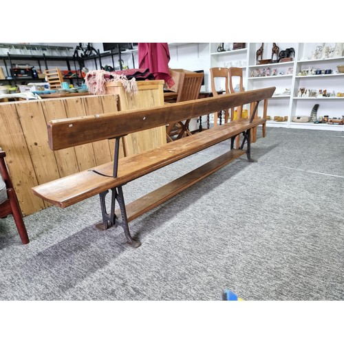 467 - Good quality antique long solid wood and cast iron framed bench removed from a tram station many yea... 