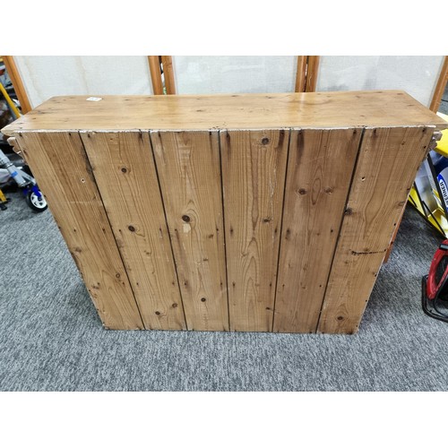 470 - Good quality solid pine vintage two door glazed book case which opens to reveal 3 shelves inside the... 