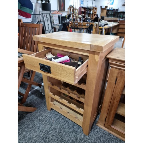 472 - Good quality modern solid oak wine rack kitchen unit with a large clean top with a drawer below havi... 