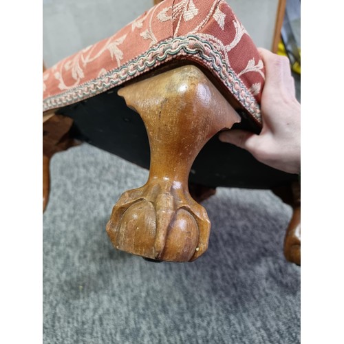 475 - Attractive upholstered foot stool standing on carved wooden claw and ball feet having a clean top an... 
