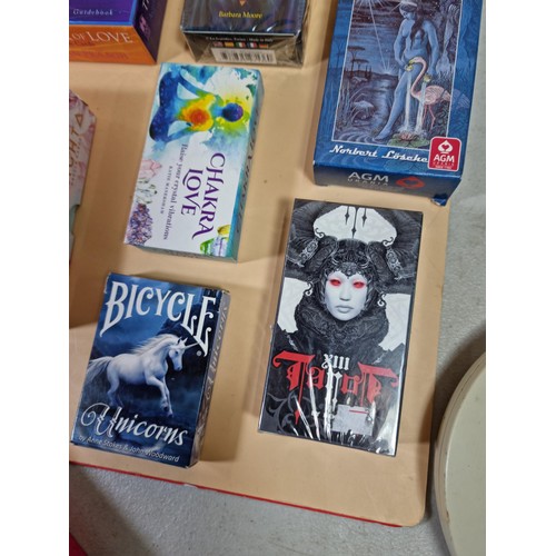 A large collection of boxed Tarot cards and similar boxed card sets ...