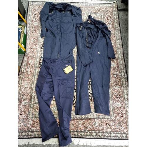 1 - A selection of overalls and work wear to inclujde two Dickies boilersuites sized 46R and 44R, an as ... 