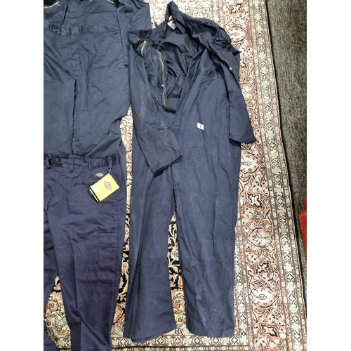 1 - A selection of overalls and work wear to inclujde two Dickies boilersuites sized 46R and 44R, an as ... 