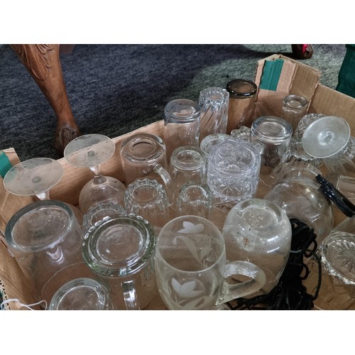 12 - A large selection of kitchenware to include saucepans, drinking glasses and consumables such as foil... 