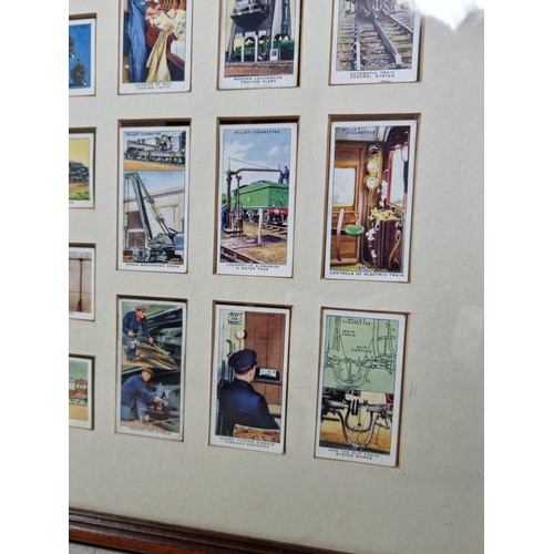 30 - A framed and glazed set of locomotive themed cigarette cards in good condition.