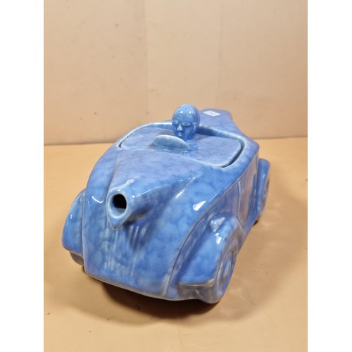 41 - A vintage Sadler racing car shaped teapot in blue complete with driver as the lid in very good condi... 