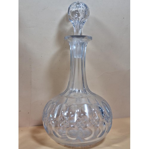 50 - Three good quality cut glass decanters complete with their original glass stoppers. All are in excel... 