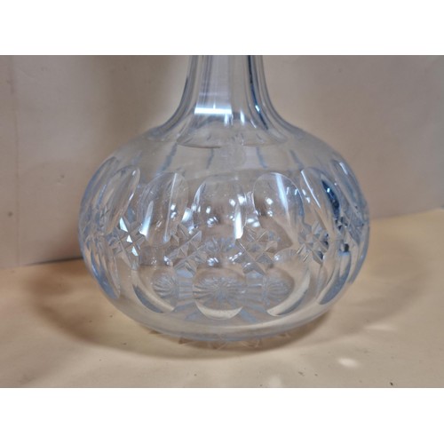 50 - Three good quality cut glass decanters complete with their original glass stoppers. All are in excel... 