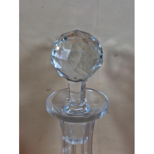 50 - Three good quality cut glass decanters complete with their original glass stoppers. All are in excel... 