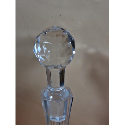 50 - Three good quality cut glass decanters complete with their original glass stoppers. All are in excel... 