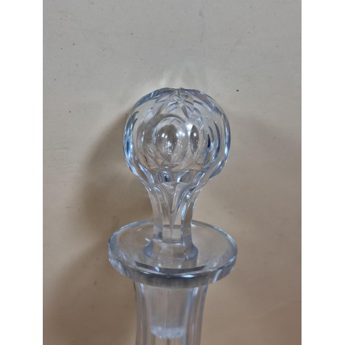 50 - Three good quality cut glass decanters complete with their original glass stoppers. All are in excel... 