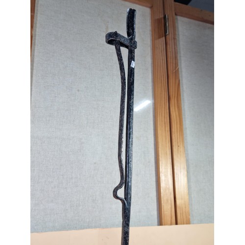 23A - A rare wrought iron floor standing 18th Century Peerman / Kienspanhalter made for bog wood the candl... 