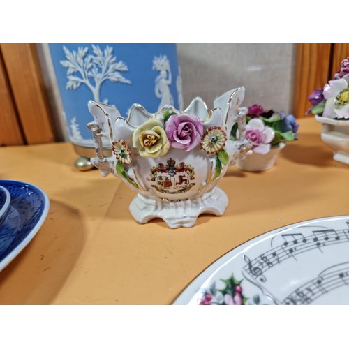 51 - A selection of items to include a quality Royal Copenhagen Christmas plate and cup and saucer set da... 