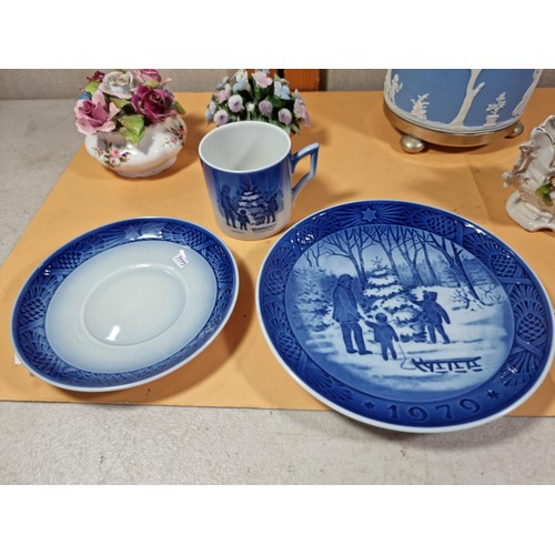 51 - A selection of items to include a quality Royal Copenhagen Christmas plate and cup and saucer set da... 