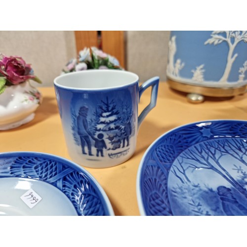 51 - A selection of items to include a quality Royal Copenhagen Christmas plate and cup and saucer set da... 