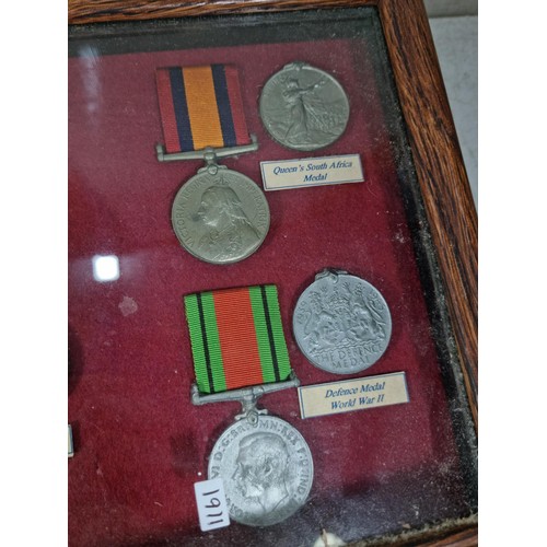A collection of 3x display boxes displaying an array of replica medals ...