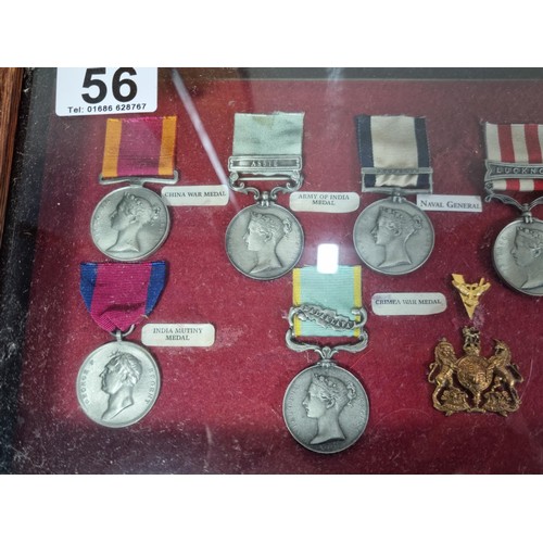 A collection of 3x display boxes displaying an array of replica medals ...
