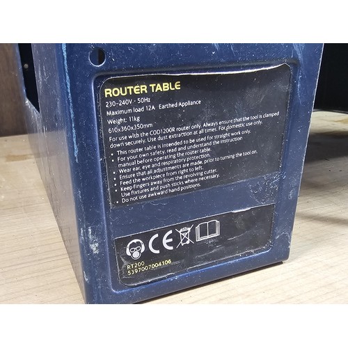 A Mac Allister router table RT200 having a double plug socket and stop ...