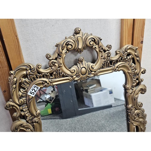 59 - A very good quality vintage gilt framed mirror the gilt frame is carved out of solid wood the frame ... 