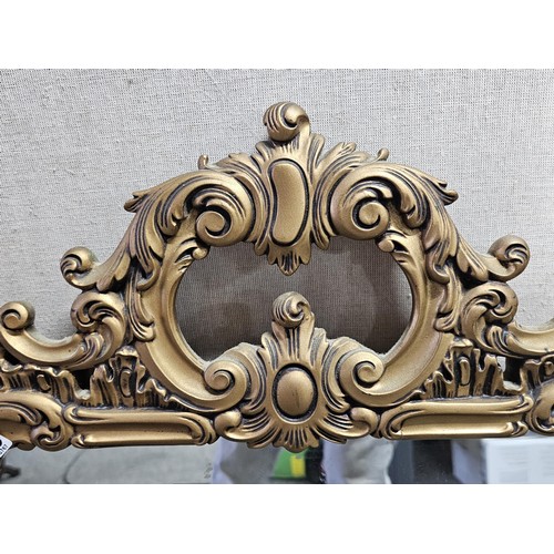 59 - A very good quality vintage gilt framed mirror the gilt frame is carved out of solid wood the frame ... 