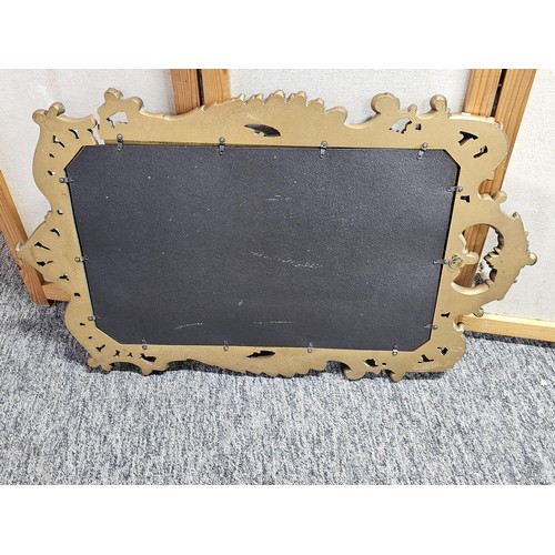 59 - A very good quality vintage gilt framed mirror the gilt frame is carved out of solid wood the frame ... 