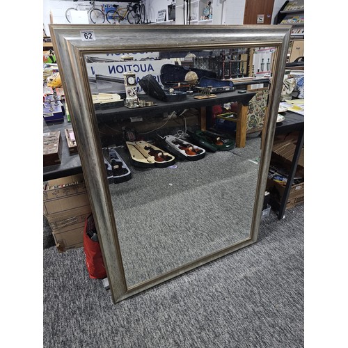 62 - Good quality silver coloured framed bevel edged mirror in good order or large proportions in good or... 
