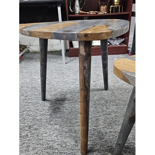 64 - A pair of plectrum shaped wooden topped modern two tone tables both in good order in a grey and brow... 