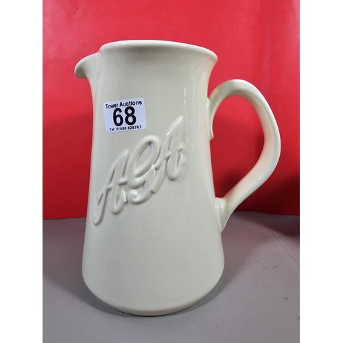 68 - A pair of good quality Aga ceramic kitchen items to include a Aga jug and a 8 person teapot both in ... 