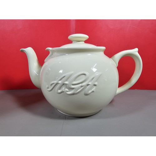 68 - A pair of good quality Aga ceramic kitchen items to include a Aga jug and a 8 person teapot both in ... 