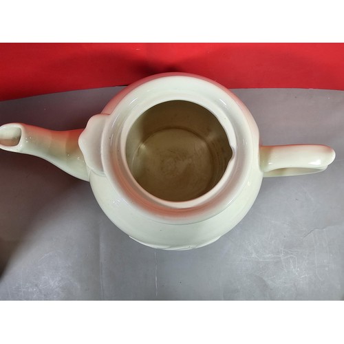 68 - A pair of good quality Aga ceramic kitchen items to include a Aga jug and a 8 person teapot both in ... 