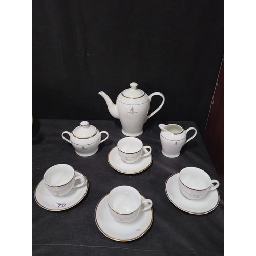 70 - A good quality 4 person tea set in white with gilding to the rim and side, to commemorate Queen Eliz... 