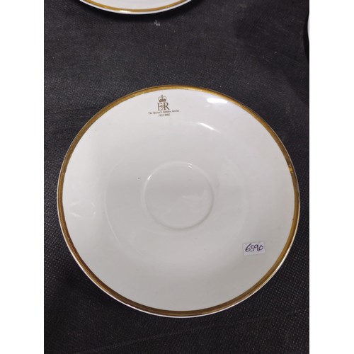 70 - A good quality 4 person tea set in white with gilding to the rim and side, to commemorate Queen Eliz... 