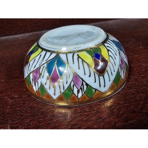 72 - A good quality Murano clown in good order with a ball in his hand and a green collar along with a ce... 