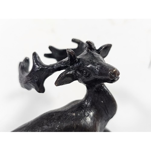 73 - A good quality well detailed bronze miniature deer figure figure with good detailing but unsigned, t... 