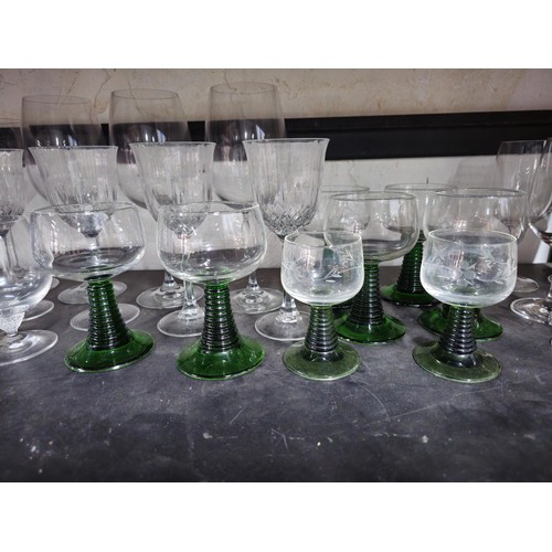 78 - A shelf full of a large collection of drinking glasses to include 9x Villeroy and Boch glasses of va... 