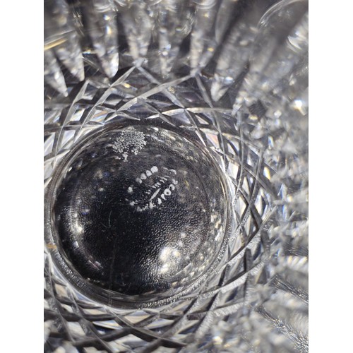 79 - A large collection of assorted cut glass crystal drinking glasses to include a total of 58 glasses t... 