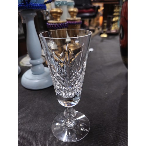 79 - A large collection of assorted cut glass crystal drinking glasses to include a total of 58 glasses t... 