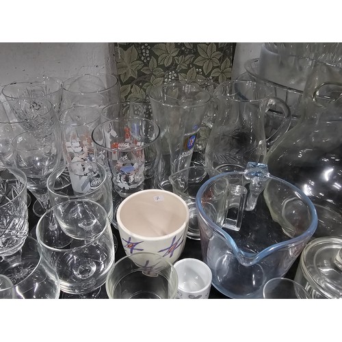 80 - A very large quantity of glass table ware and drinking glasses to include wine glasses, sherry glass... 