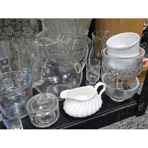 80 - A very large quantity of glass table ware and drinking glasses to include wine glasses, sherry glass... 