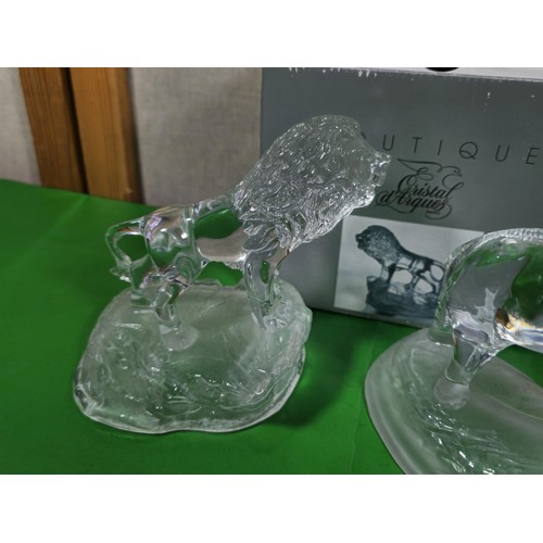 82 - A collection of 4x Cristal D' Arques France glass animal figures to include a lion, an elephant, a h... 