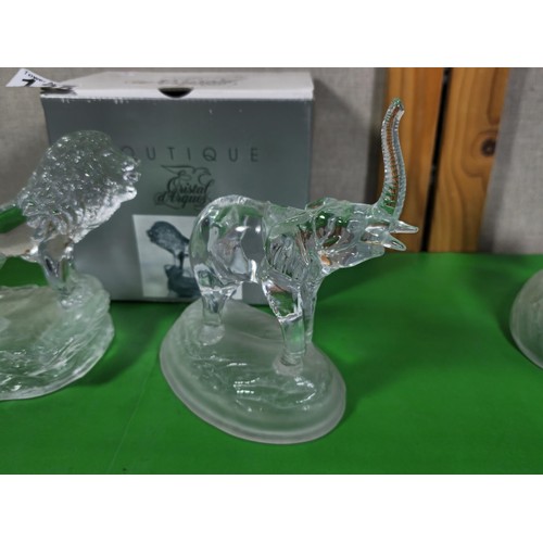 82 - A collection of 4x Cristal D' Arques France glass animal figures to include a lion, an elephant, a h... 