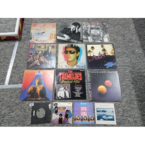 97 - A selection of vinyl records, to include some popular artists. Albums by 10cc, Brian Ferry, Billy Jo... 