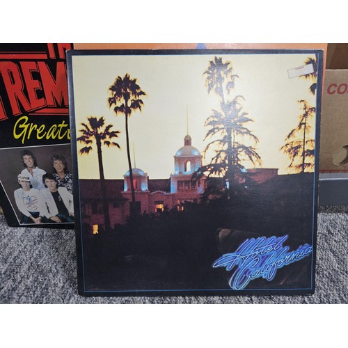 97 - A selection of vinyl records, to include some popular artists. Albums by 10cc, Brian Ferry, Billy Jo... 