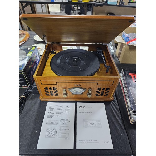 98 - A modern retro style Itek record player with built in radio CD and cassette player, in working order... 